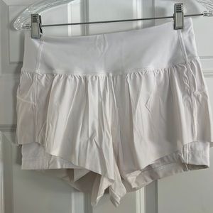 White athletic shirt with spandex lining. Lulu lemon